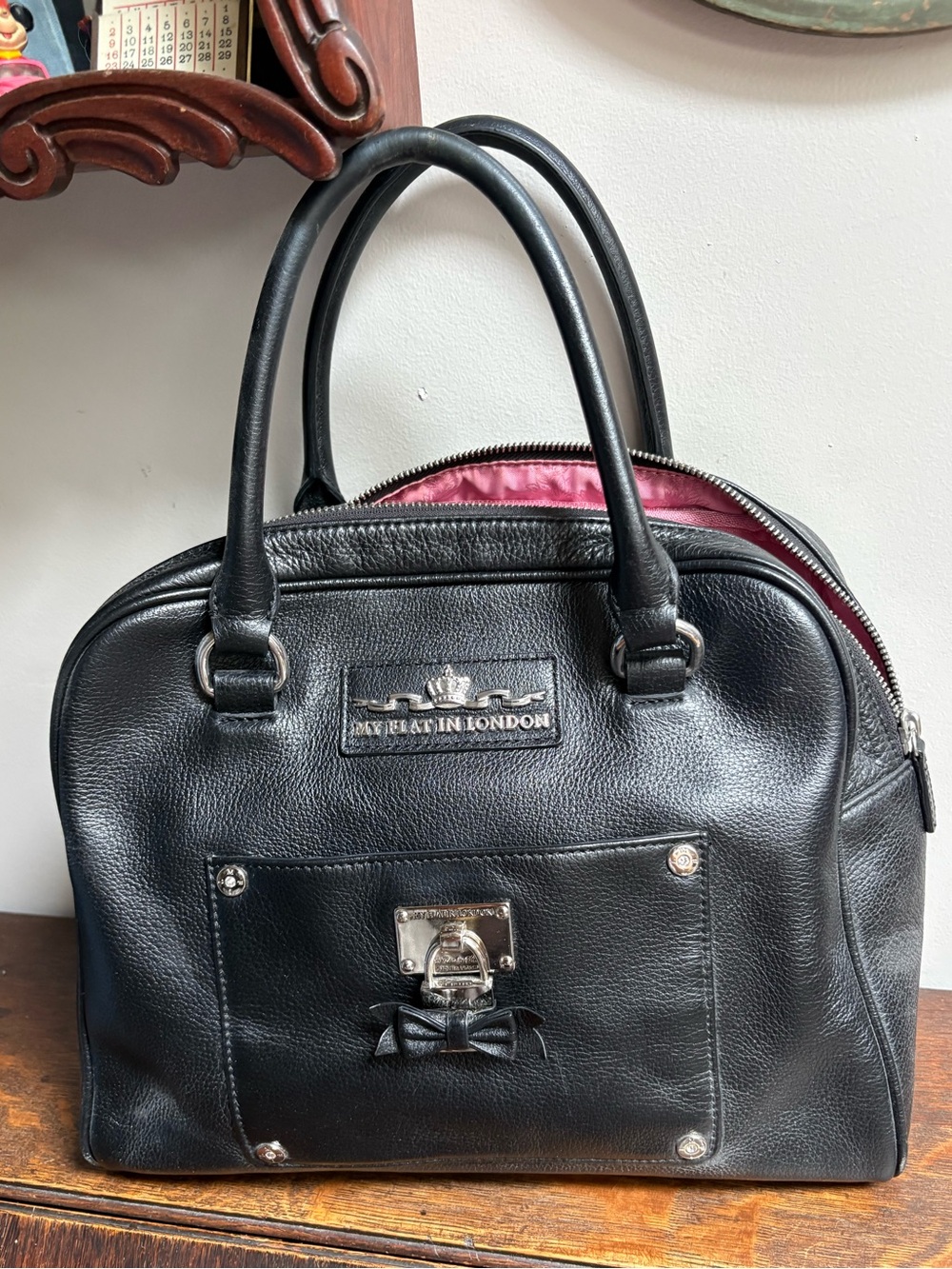 My flat in London, black pebbled, leather bowling bag style handbag